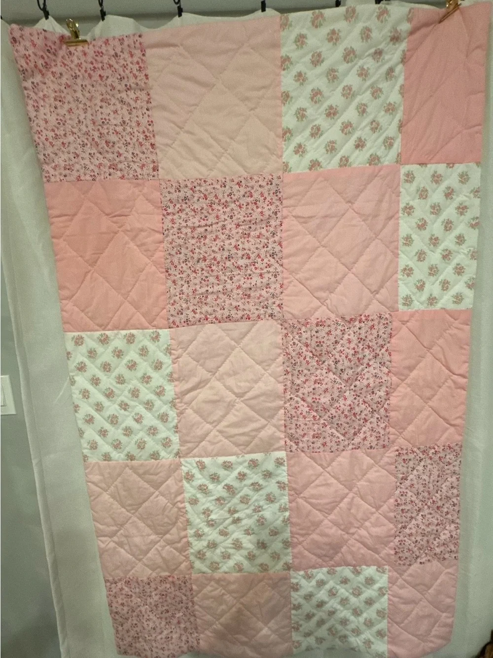 Handmade Pink Patchwork Quilt for your babies crib or toddler bed.